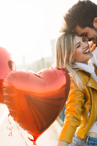 Couple in love kissing laughing and having fun